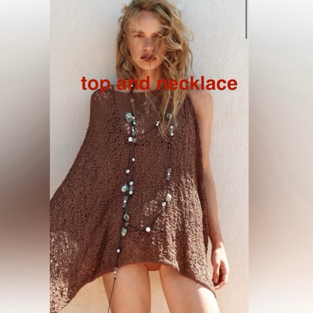 Buy the look
Zara ASYMMETRICAL KNIT CAPE M brown camel and Nesklace